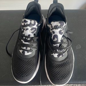 APl tie up tennis shoes.